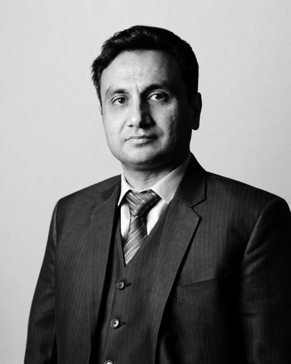 Portrait of Dr Qasim Shah